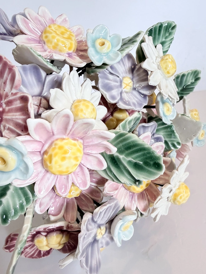 Pastel coloured porcelain flowers 