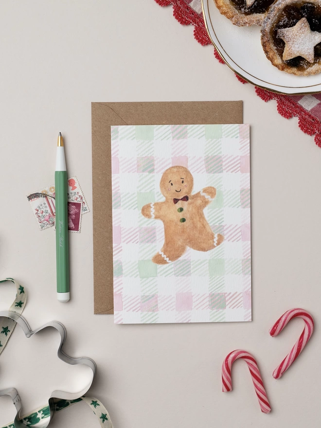 Christmas Gingerbread Person Card on watercolour painted gingham check background