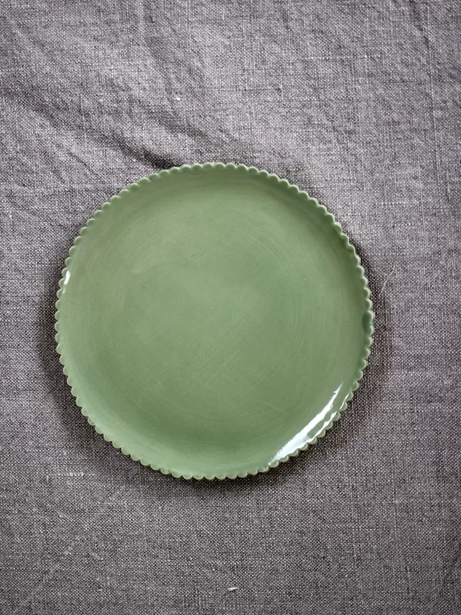sage green scalloped edge plate