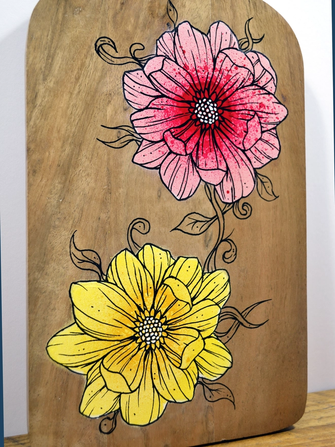 Handpainted serving board with a design of roses
