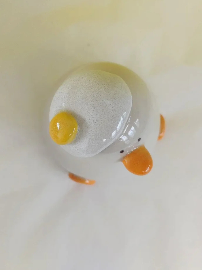 Duck egg head ceramic sculpture