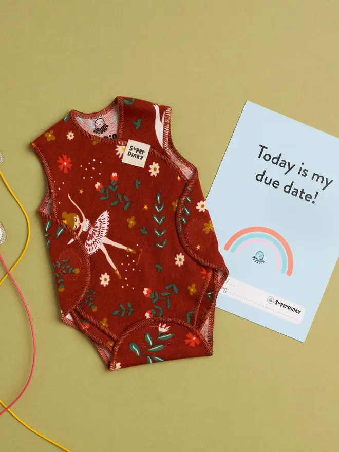 Deep red colour preemie baby vest with cute ballerina and flowers print 