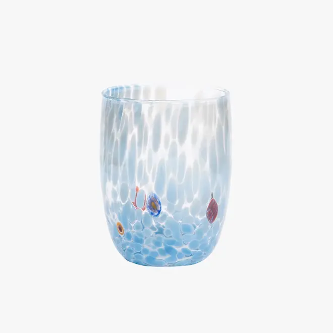 round tumbler glass with pale blue splotches
