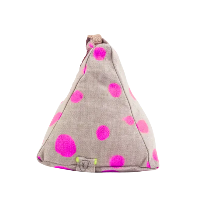 Hand Painted Linen Sustainable Doorstop In Polka Dot Print, a colourful neon pink doorstop against a white background. 