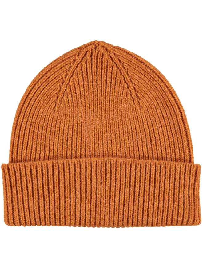 Ribbed Lambswool Unisex Beanie, a colourful ribbed beanie sitting on a white surface. 