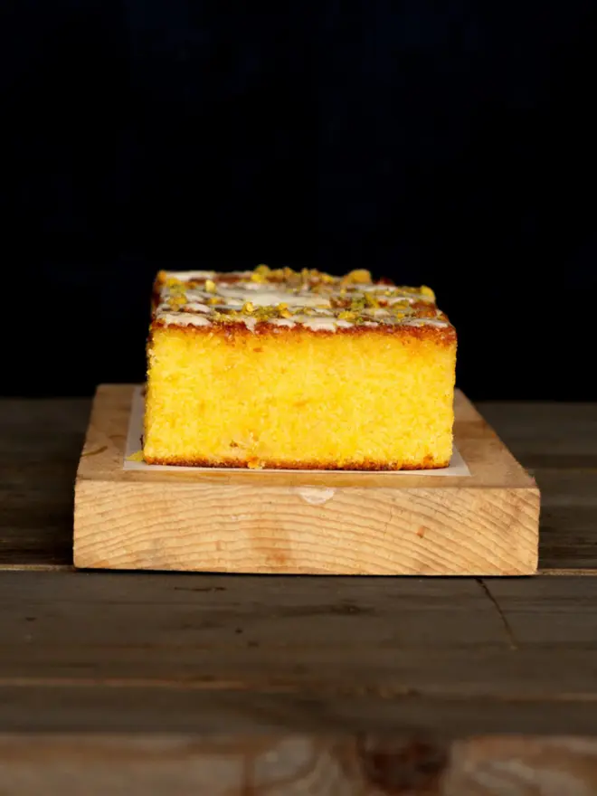 A tray of orange polenta cake