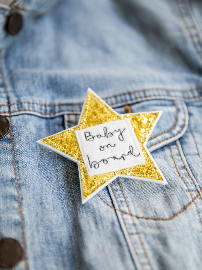 Sparkly gold star badge