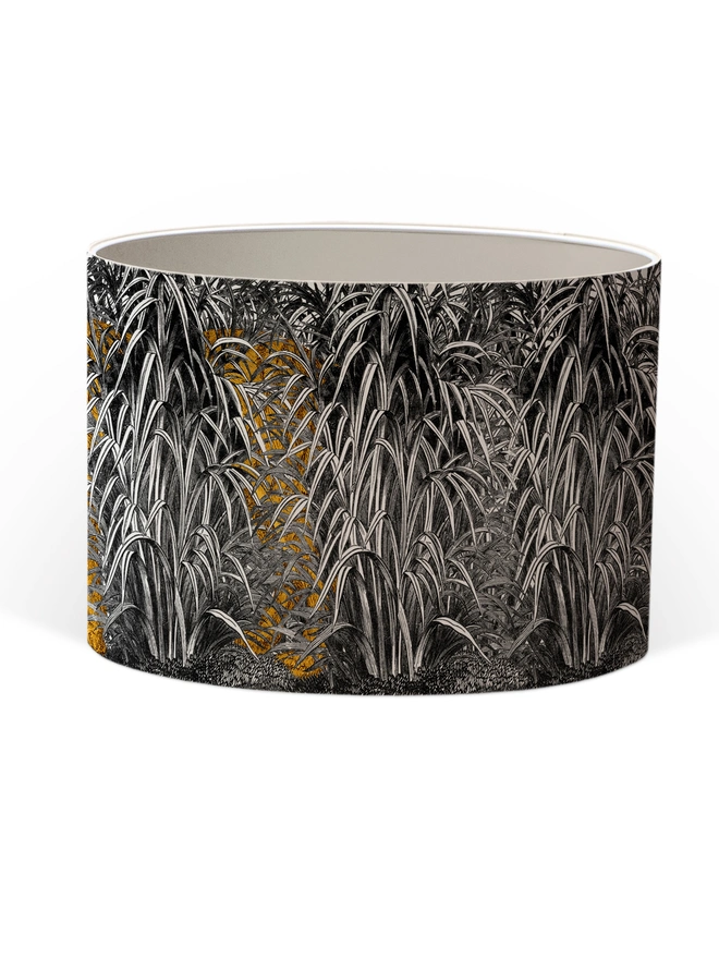 A decorative lampshade featuring an elegant tiger moving through tall tropical grasses, inspired by Henri Rousseau’s jungle paintings, with a rich botanical design.