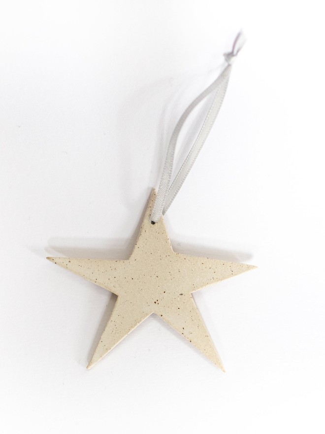 white hanging star decoration