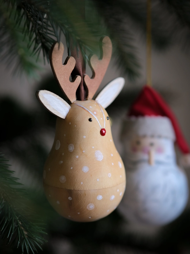 Handcrafted wooden Rudolph Christmas decoration opened to reveal a tiny “Dear Rudolph” note, 