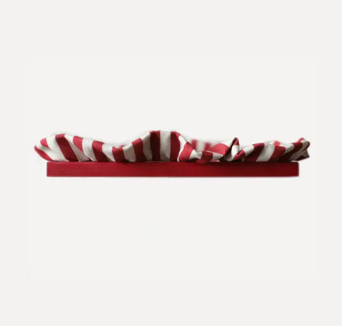 Soft ruffle frame with red and white striped fabric trim on a white background.