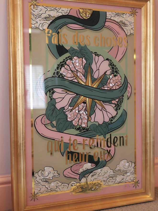 'Do Things That Make You Happy' Gold Leaf Glass Artwork, a large colourful print with a star motif sitting on a green backdrop. 