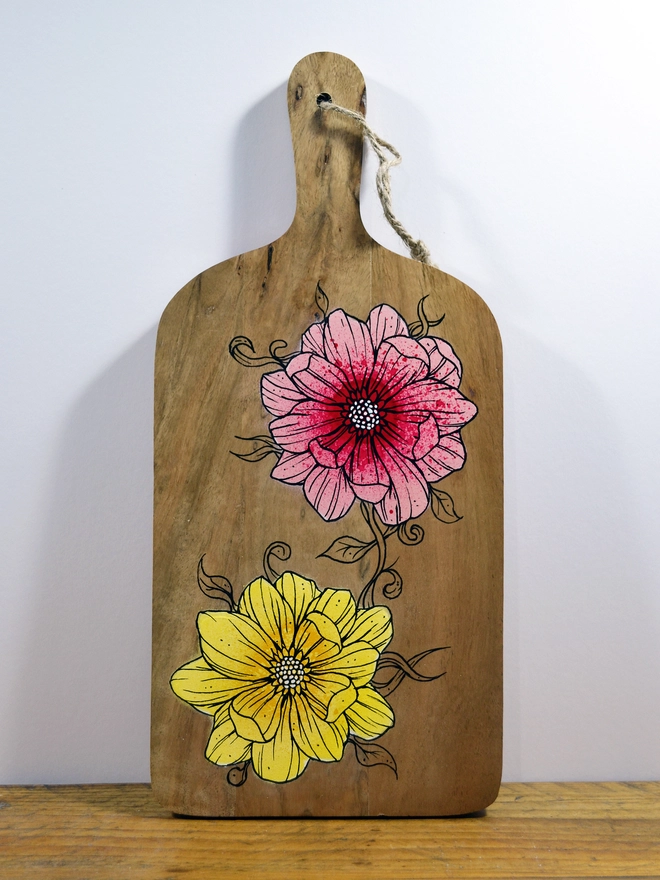 Handpainted serving board with a design of roses
