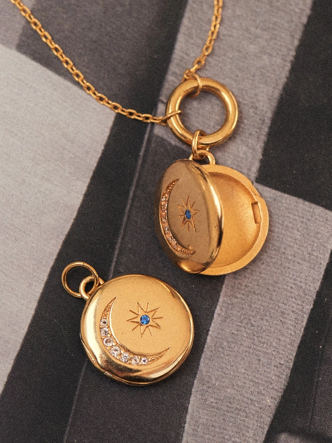 gold necklace with pendants and charms