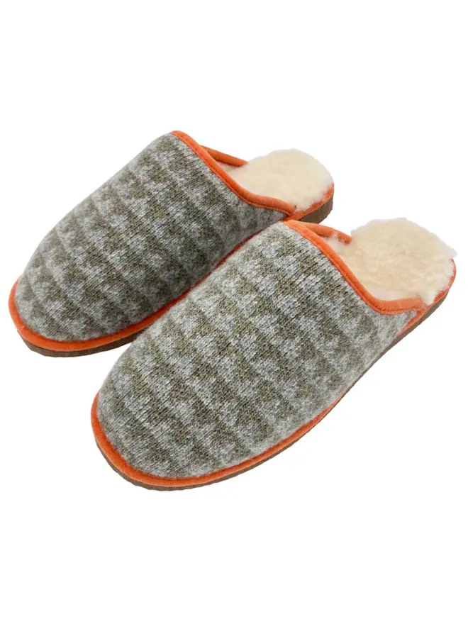Women's Lambswool & Sheepskin Slippers, a pair of colourful slippers sitting on a white plain surface. 