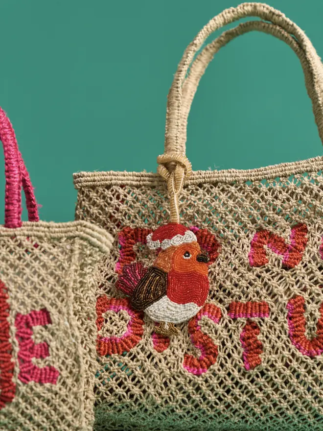 The Jacksons jute bag with beaded bag charm 