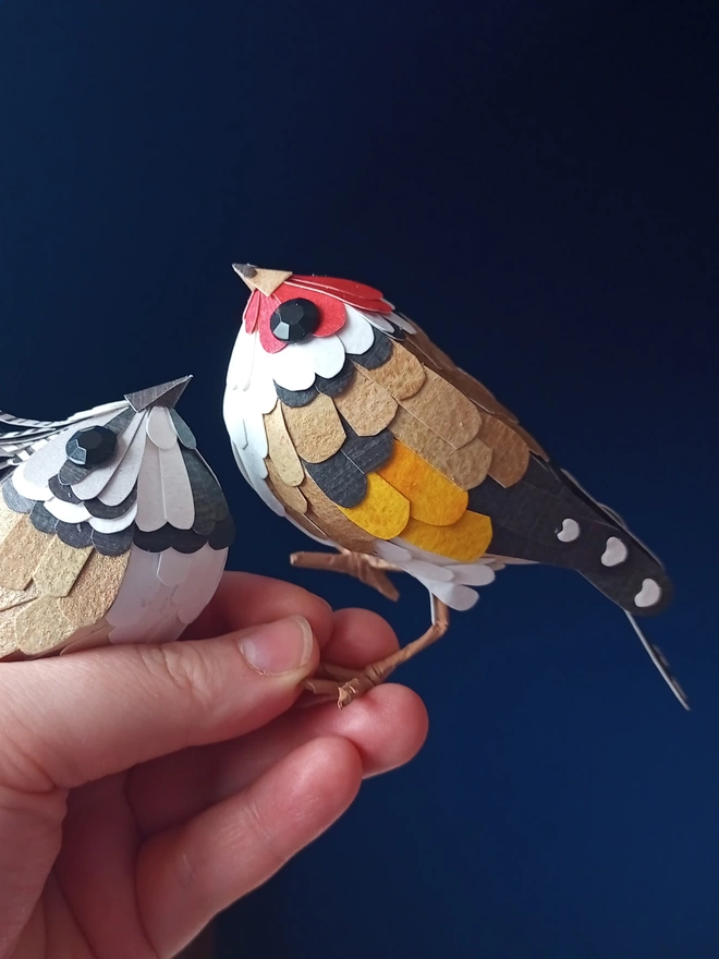 standing goldfinch sculpture