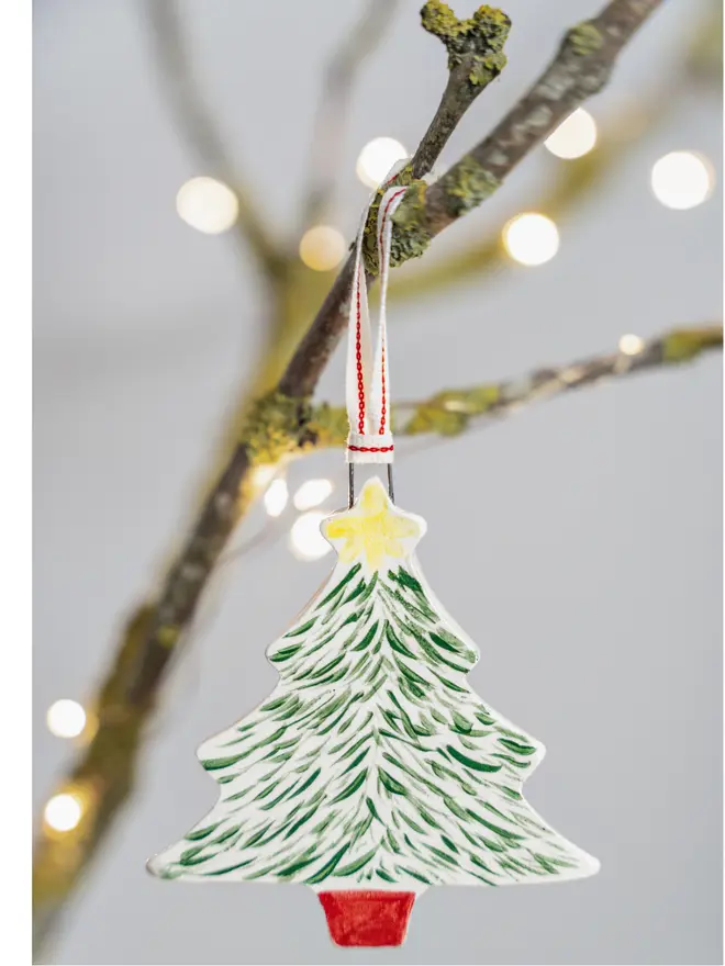 Green tree with red pot and yellow star. Cotton ribbon
