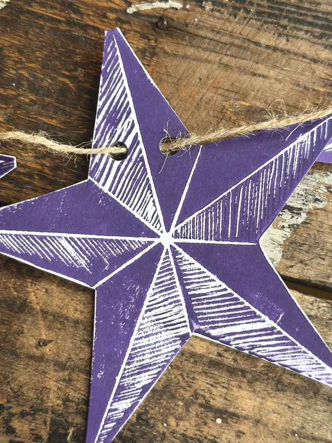 'Bright Star' Colourful Hand Printed Linocut Garland Purple Star Close Up With Bunting Natural String