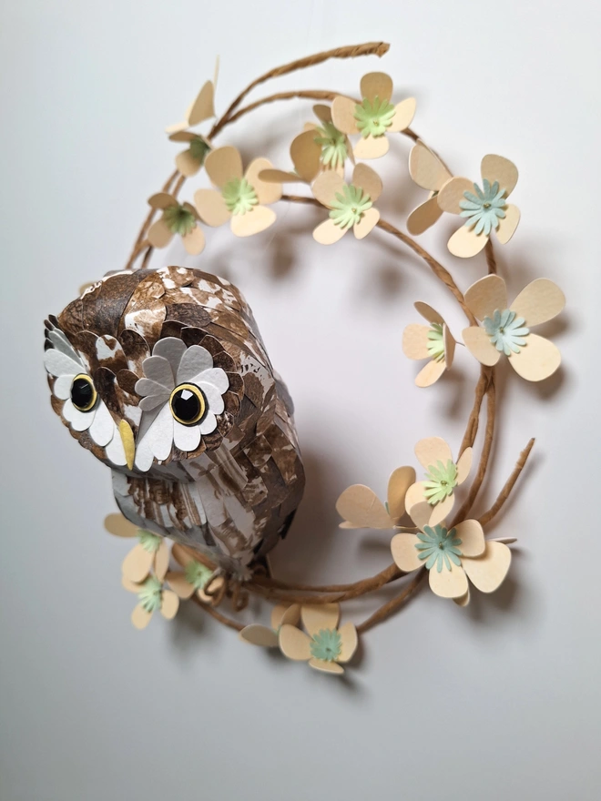 handmade wall art of a boreal owl on a spring wreath