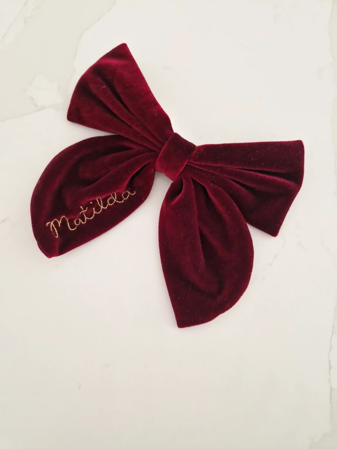 red hand embroidered velvet hair bow clip