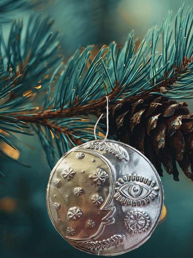 hand embossed tin moon christmas decoration susan bradley