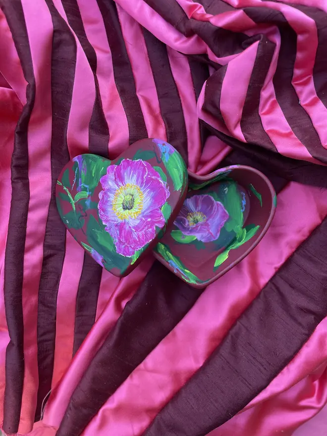 hand painted ceramic heart shaped keepsake box deep red background with pink Icelandic poppy flowers 