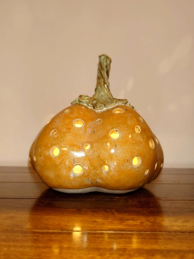 Pumpkin candle holder