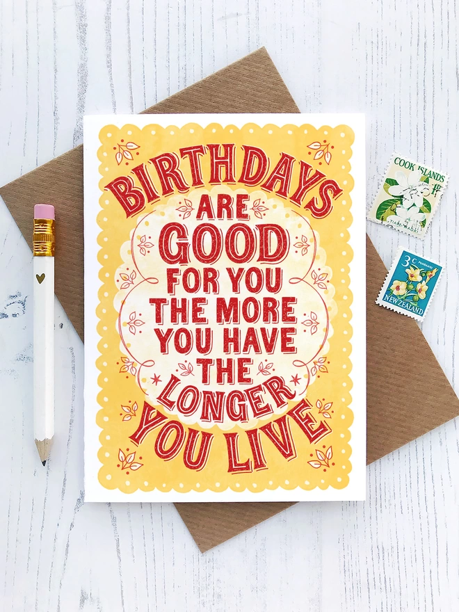 red and yellow birthdays are good for you card with stamps and white pencil