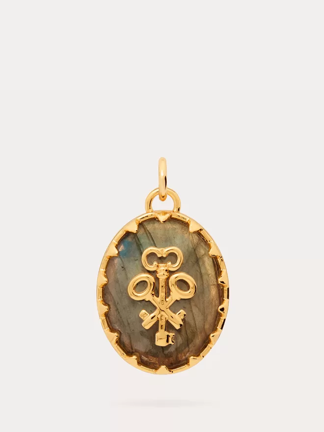 front view of a three keys pendant featuring a natural labradorite stone