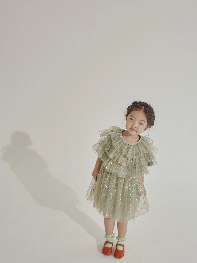 green sparkle dress and cape