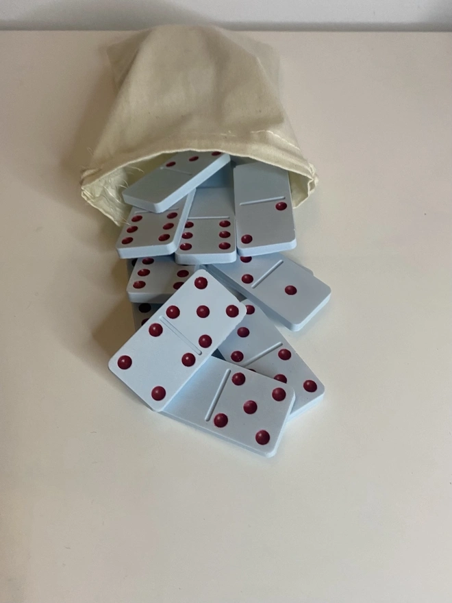 Handmade Valentines And Colourful Jesmonite Dominoes, a group of colourful dominoes on a white surface. 