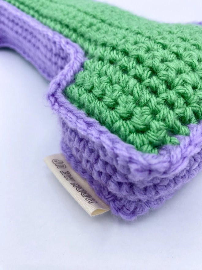 Crochet cushion shaped like the letter I in Sage Green and Lilac