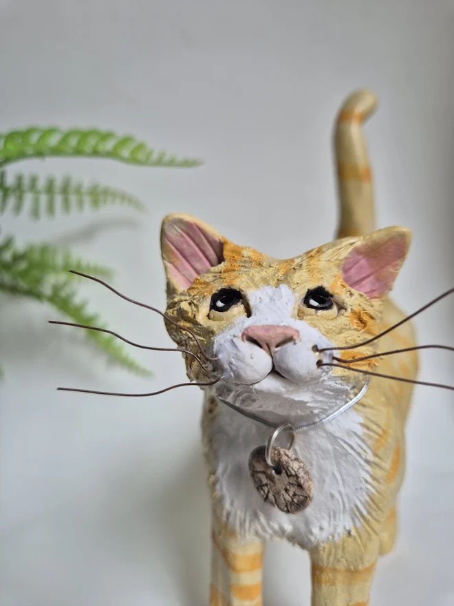 Ginger cat sculpture 
