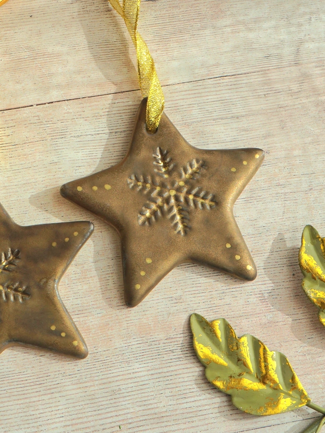 christmas star tree decoration, ceramic christmas star, ceramic snowflake star decoration, ceramic christmas decoration gold. ceramic snowflake gold, christmas tree decoration, Jenny Hopps Pottery 