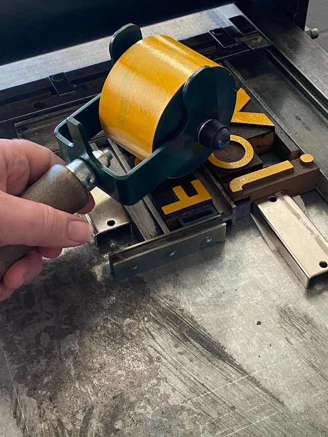 Hand inking vintage wood type