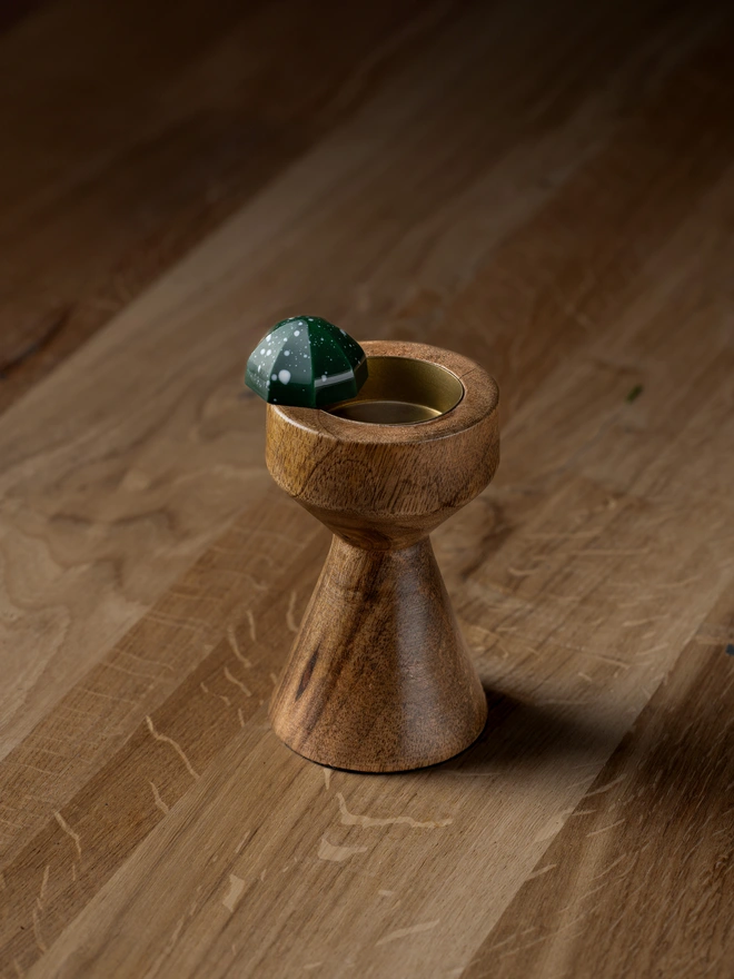 Shiny dark green chocolate displayed with Christmas theme