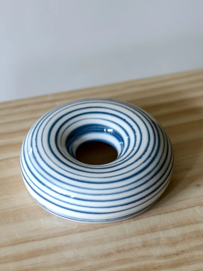 Avocado Planter White & Blue Handmade porcelain avocado planter with carved blue pattern, designed to hold an avocado seed for sprouting