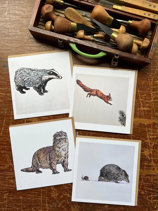 four art cards badger, red squirrel, otter and hedgehog