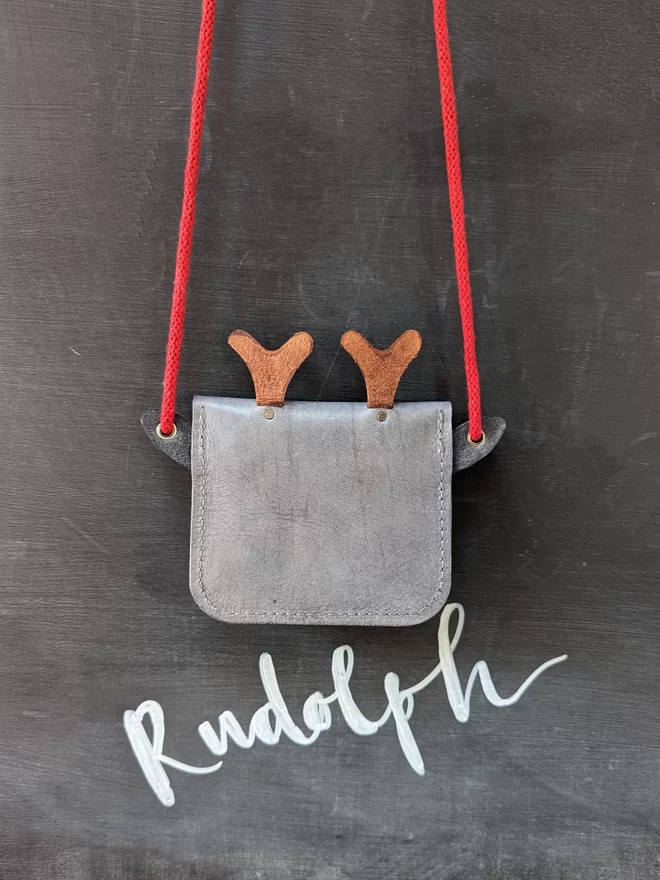 Back view of hand dyed leather Rudolph cross- body purse in grey.