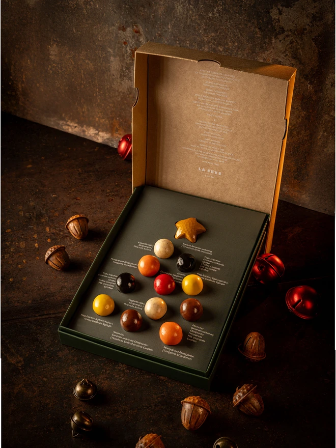 Christmas tree chocolate open, showing 12 handmade chocolates