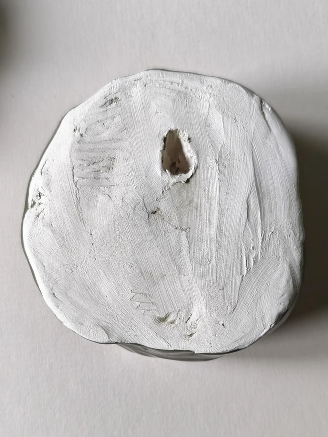 dark green glazed handmade ceramic rose from the back