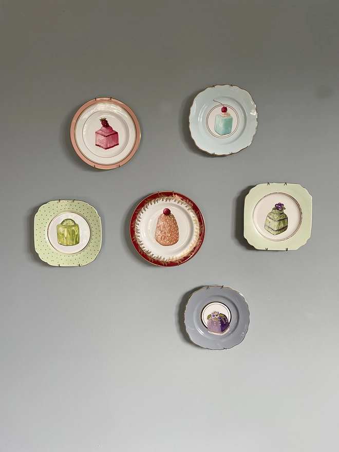 plate display of painted cakes