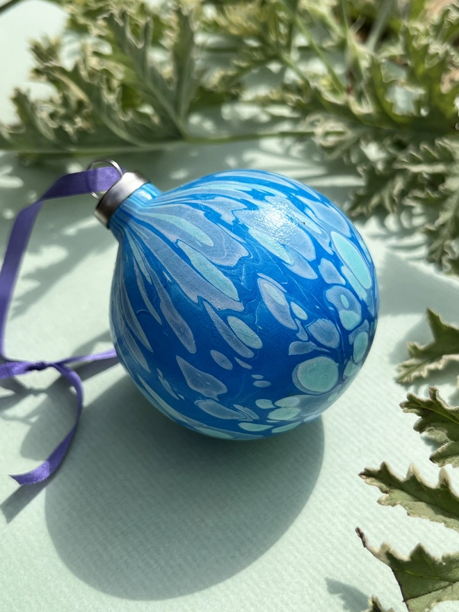 Hand-marbled round ceramic Christmas bauble