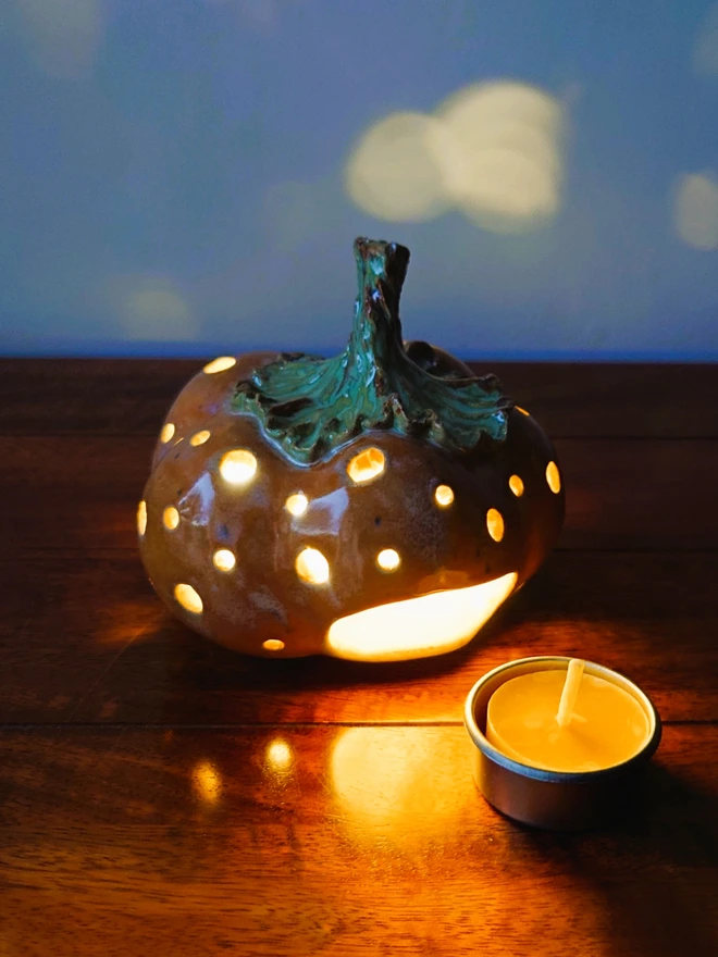 Pumpkin candle holder