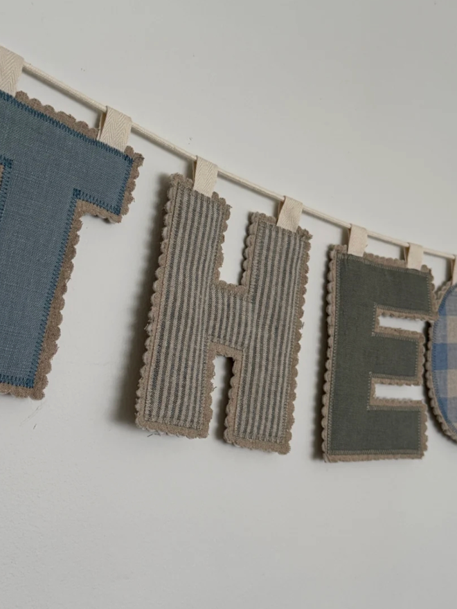 Linen Name Garland. A garland reading THEO