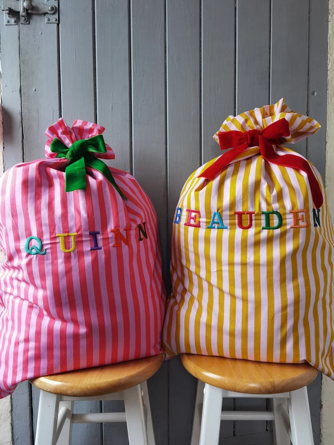 Personalised bright striped Christmas sacks