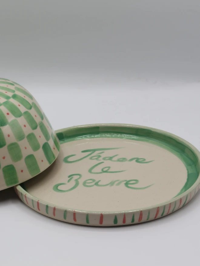 Green butter dish with J'adore le Beurre on the base