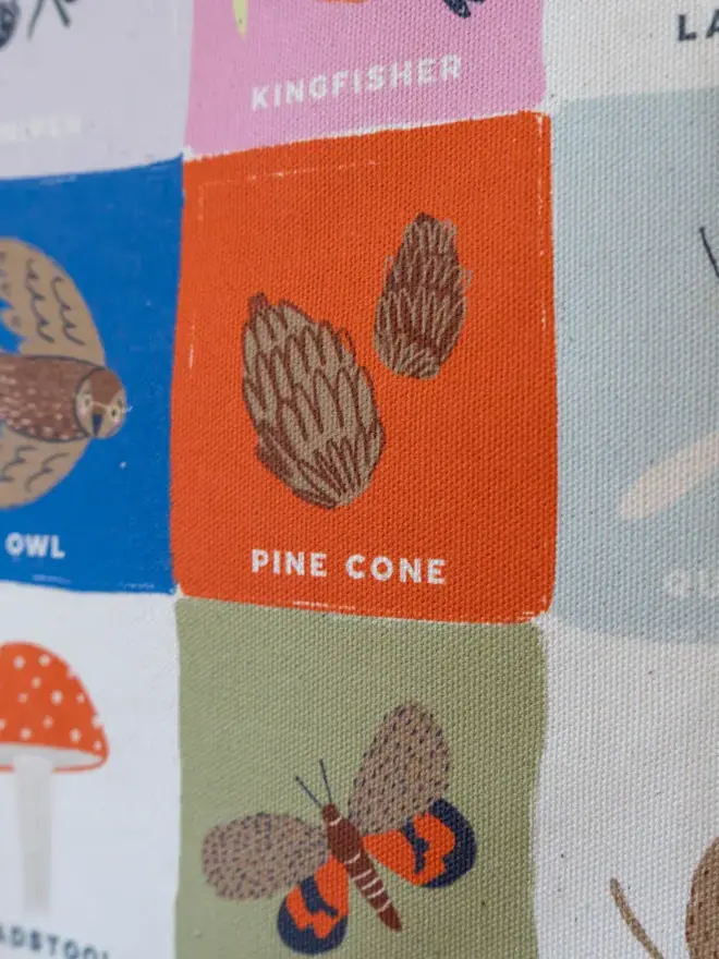 Rainbow Woodland Alphabet Fabric Banner, close up. 
