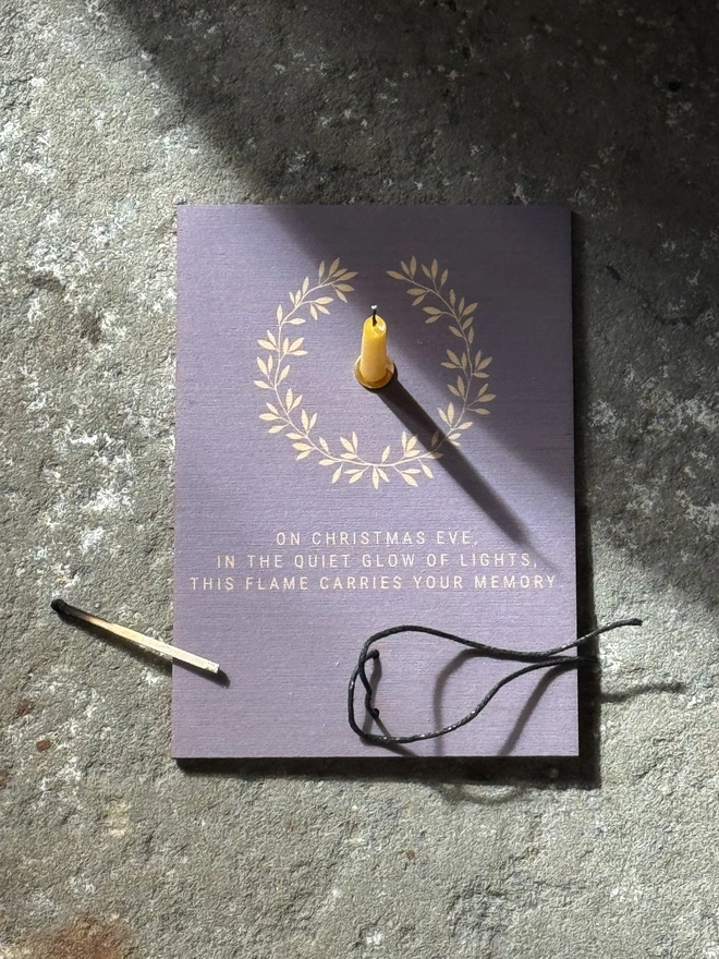 grief and loss at christmas card with memorial candle